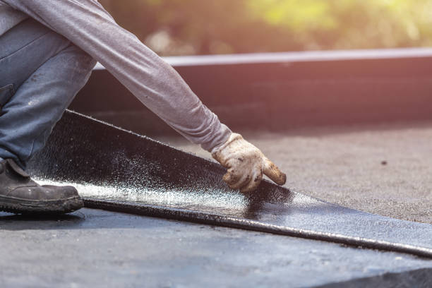 Professional Basement Waterproofing technician working in Doylestown, WI